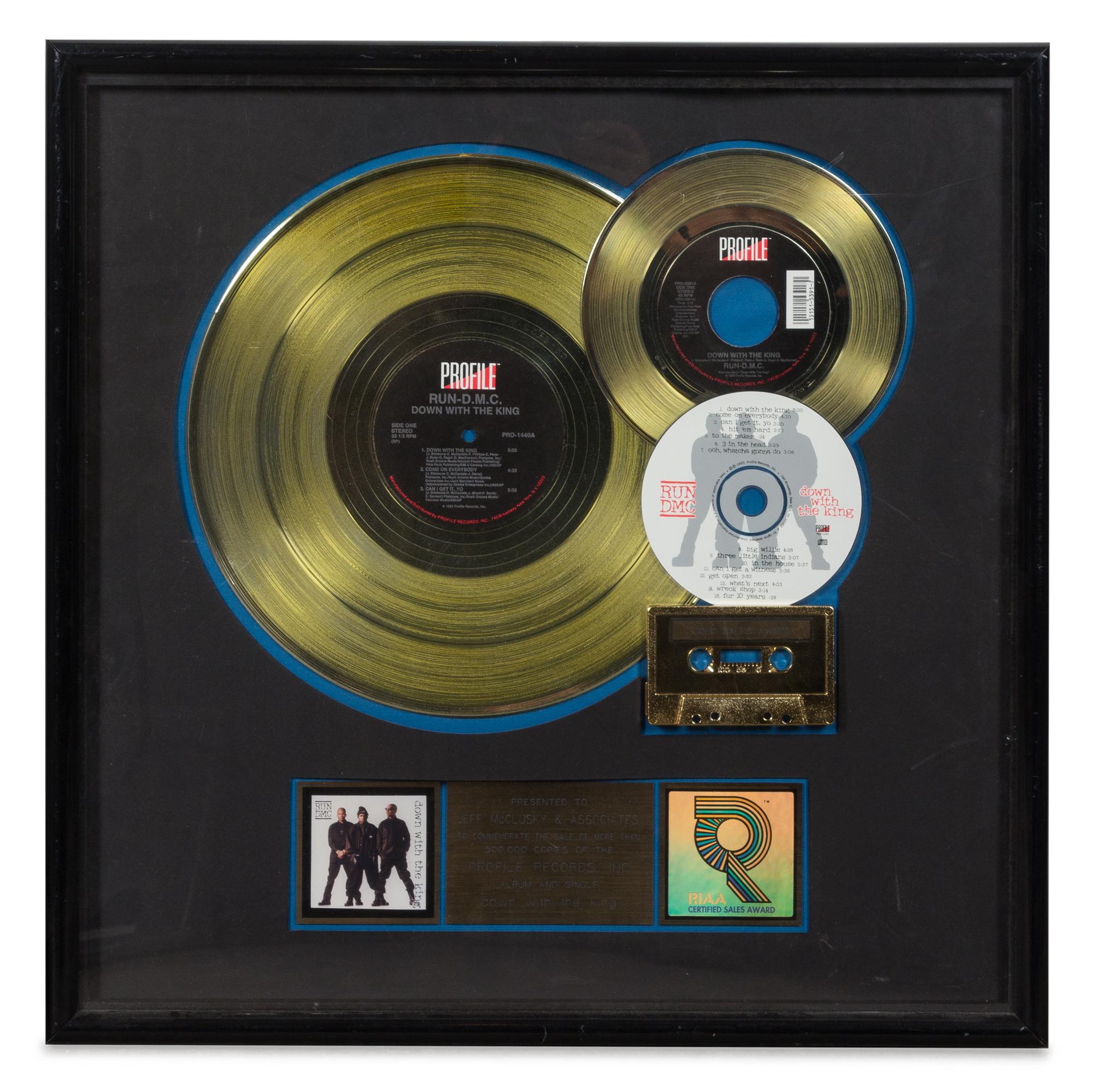 A Run-D.M.C.: Down with the King RIAA Certified Gold Presentation Album 21 x 21 inches.