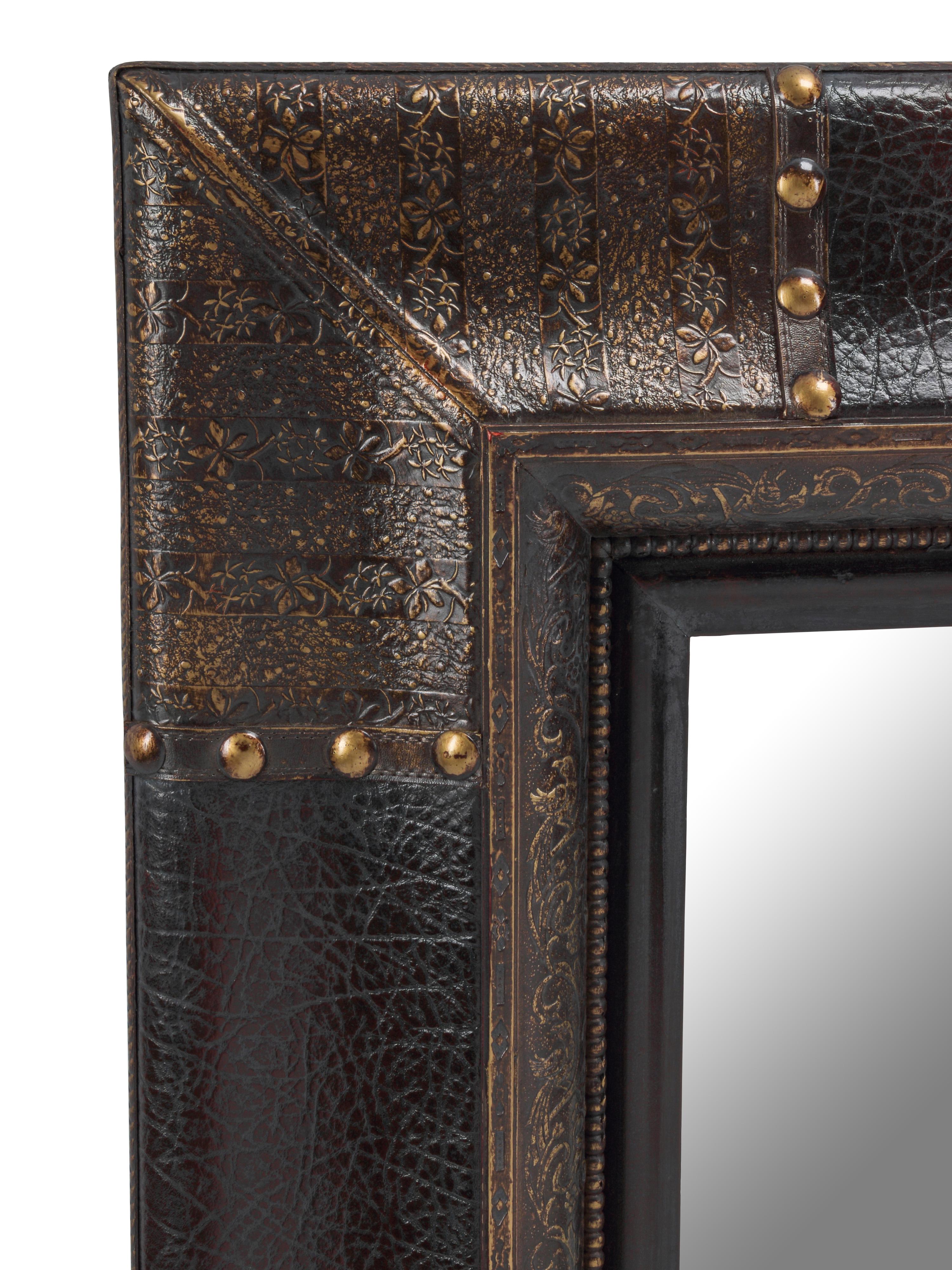 A Pair of Portuguese Style Embossed and Parcel-Gilt Leather Mirrors
