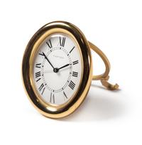 A Cartier Brass Travel Alarm Clock Height 3 1/2 inches. — 20TH CENTURY