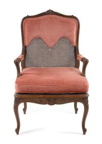 A Louis XV Style Caned Fauteuil Height 41 inches. — 19TH CENTURY