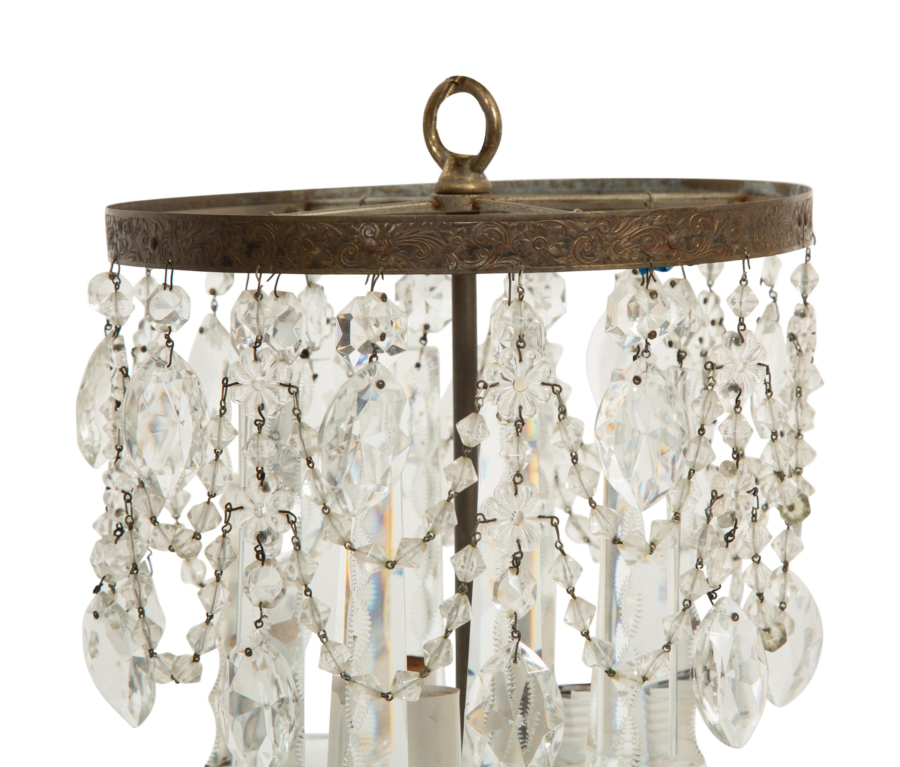 A French Gilt Metal and Cut Glass Three-Light Chandelier