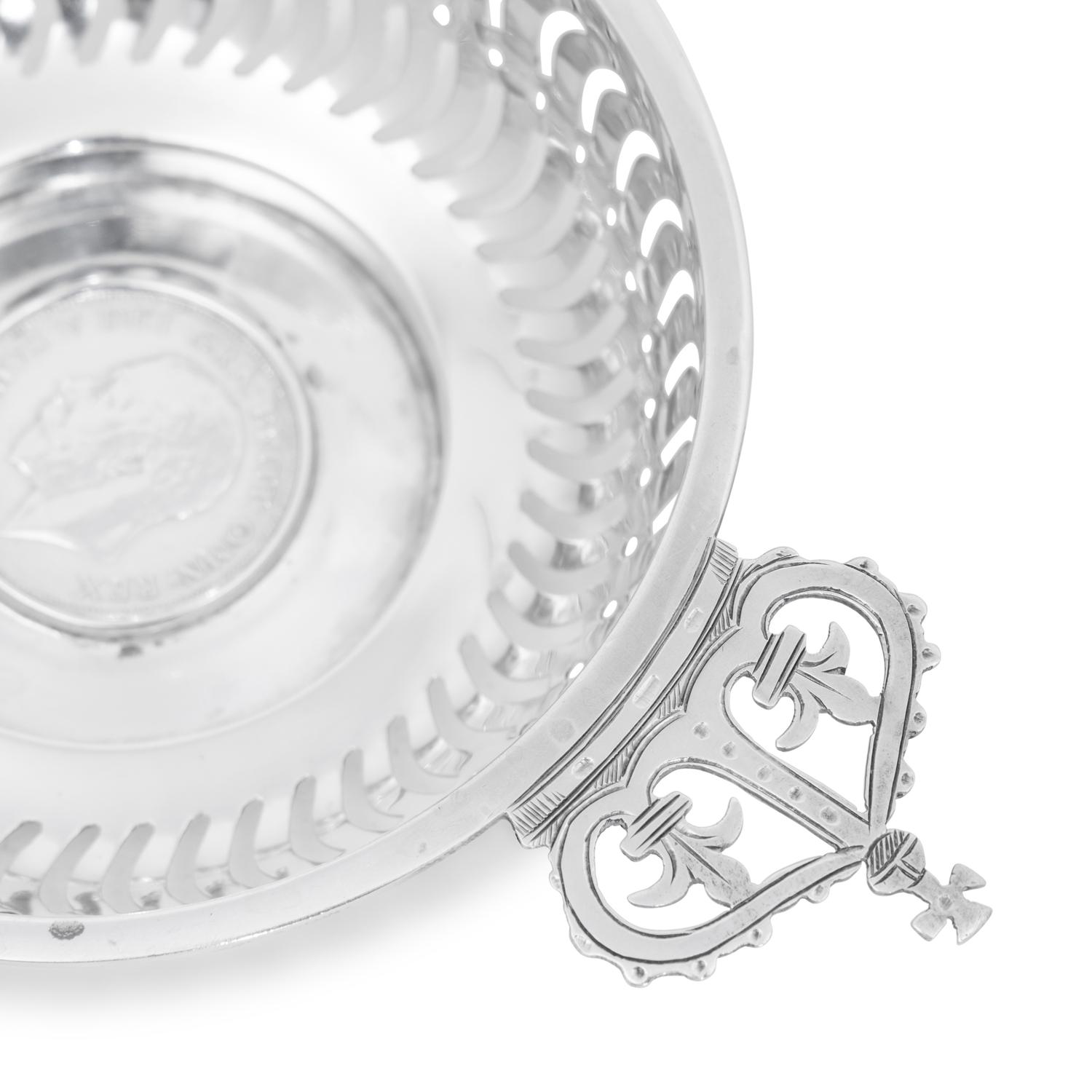 A Set of Four English Silver Coin-Inset Nut Dishes
