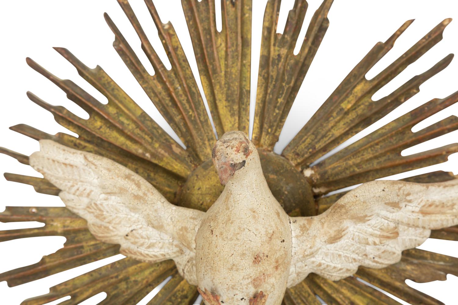 An Italian Carved and Painted Giltwood Dove on Sunburst