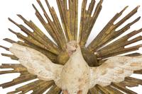 An Italian Carved and Painted Giltwood Dove on Sunburst