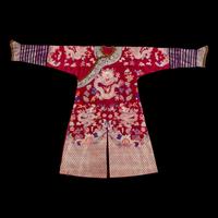 A Chinese Maroon Ground Silk Brocade 'Dragon' Robe, Jifu, Late Qing Dynasty 清晚期 絳紅地織錦龍紋吉服