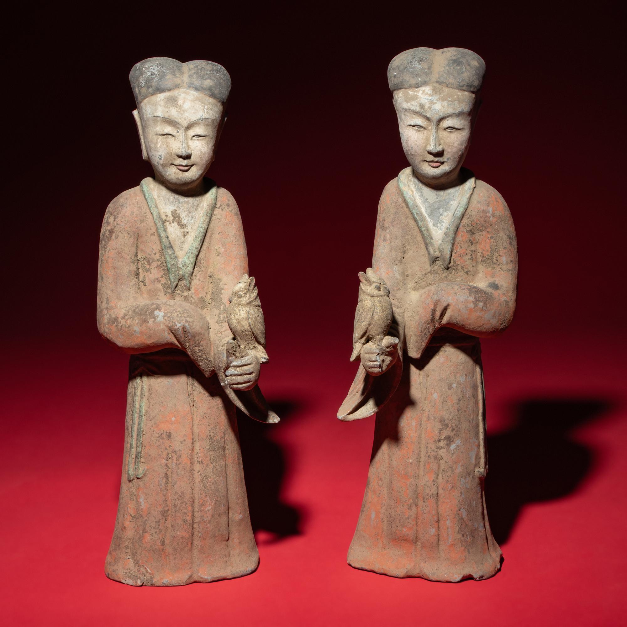 A Pair of Chinese Painted Grey Pottery Ladies with Owls, Han Dynasty — 漢 灰陶彩繪持鷹女俑一對