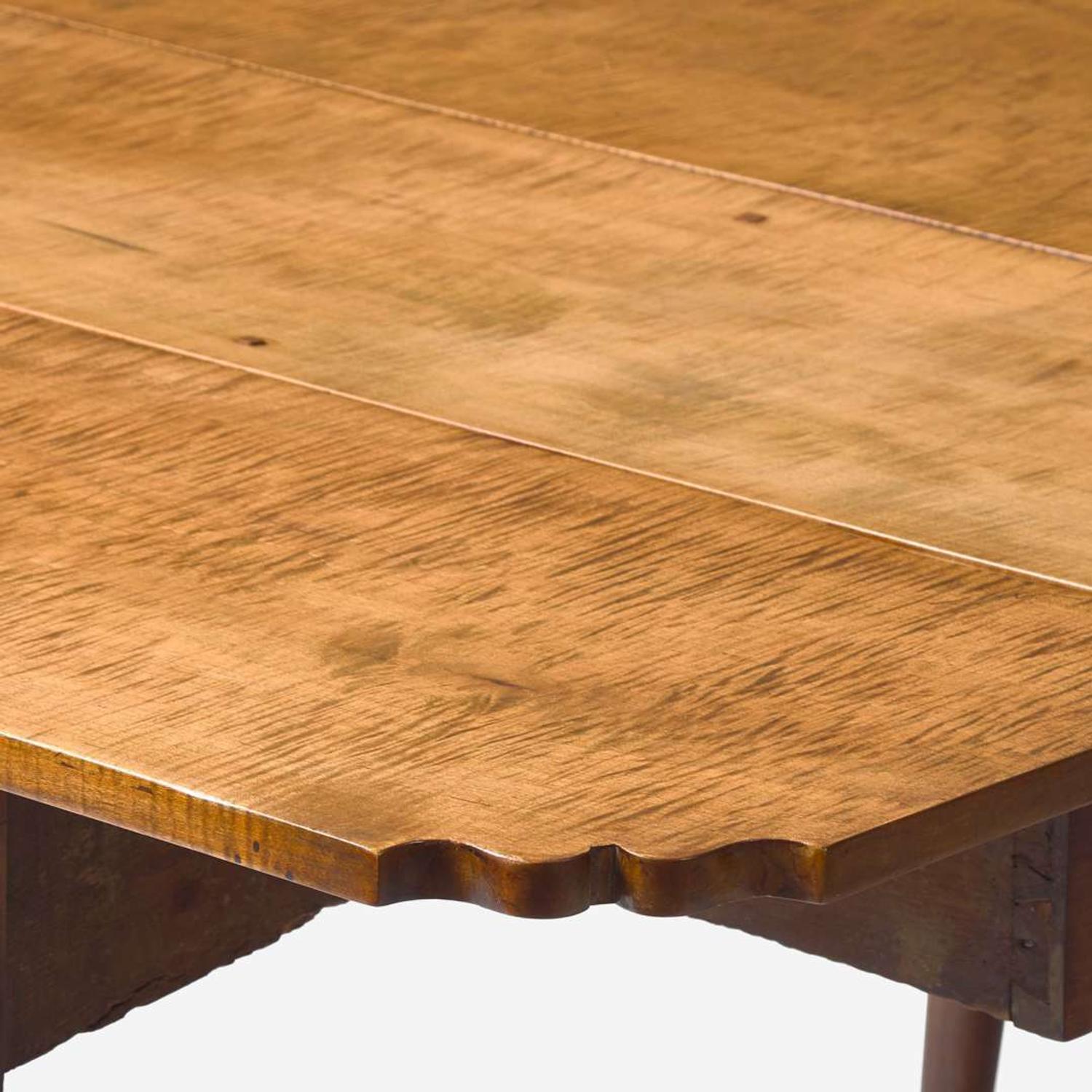 A Queen Anne tiger maple drop leaf table New England, 18th century