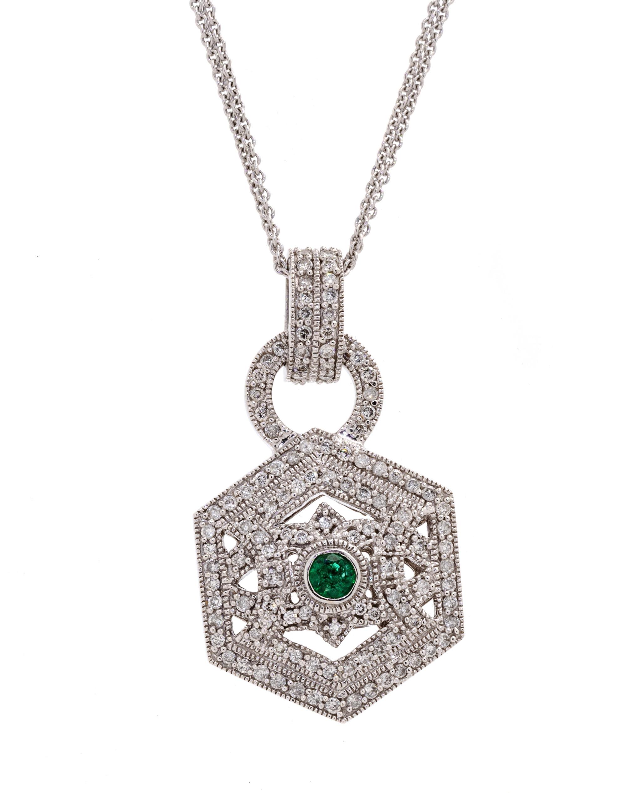 A 14 Karat White Gold, Emerald and Diamond Pendant/Necklace,