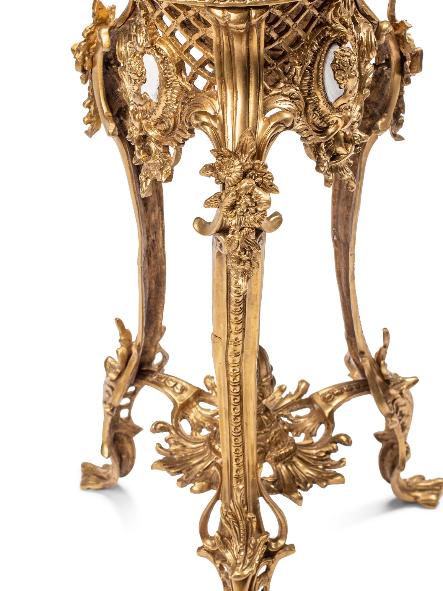 A Pair of Continental Gilt Bronze Stands
