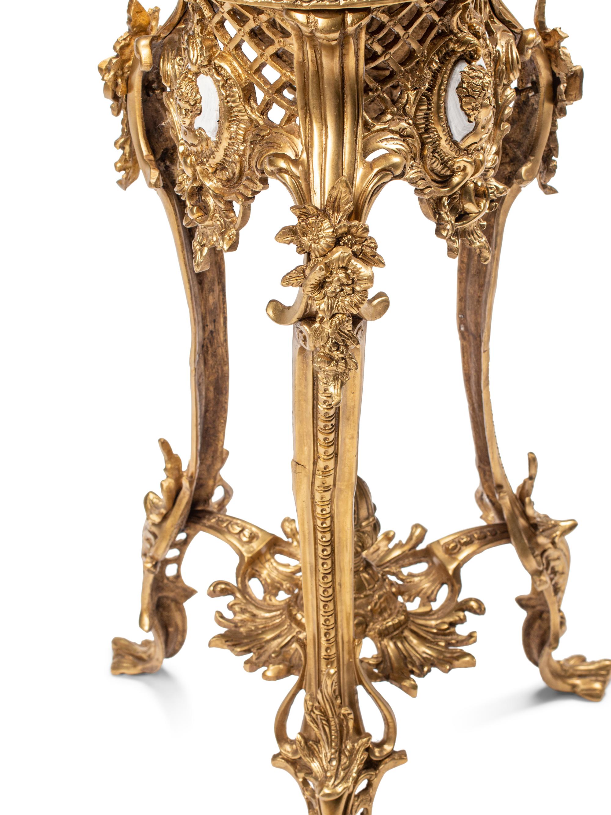 A Pair of Continental Gilt Bronze Stands