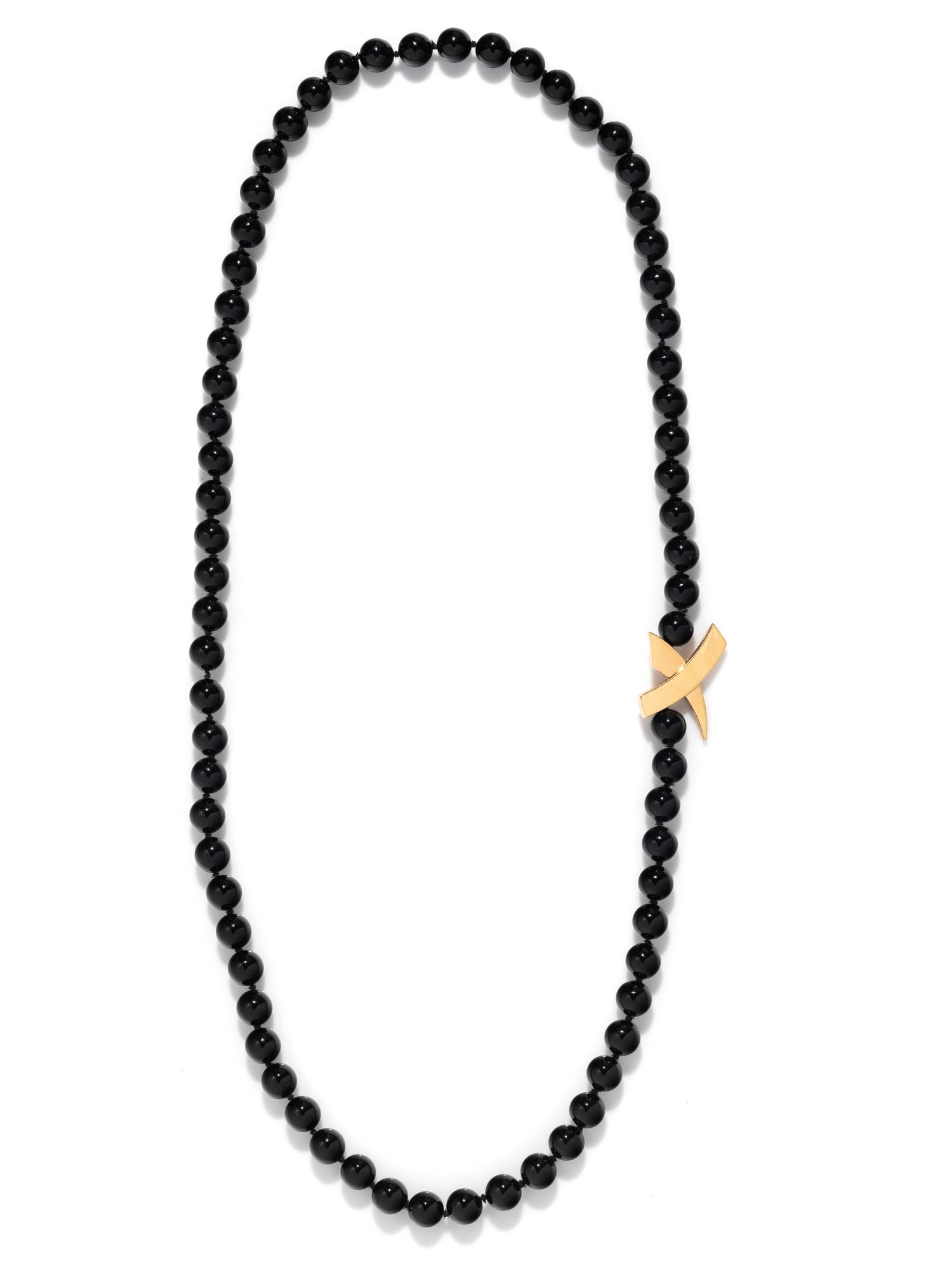 TIFFANY & CO., PALOMA PICASSO, FRENCH, YELLOW GOLD AND ONYX NECKLACE