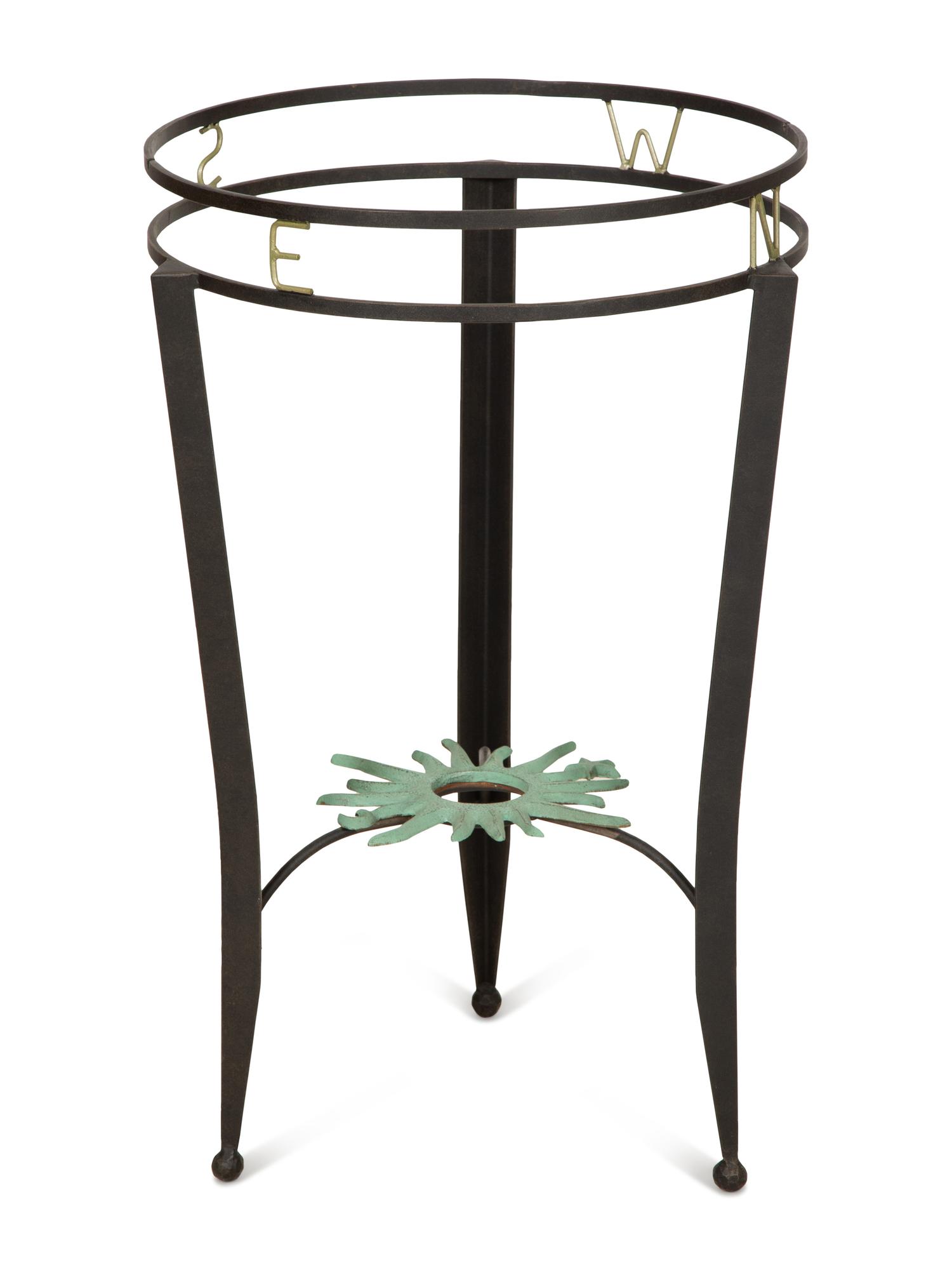A Wrought Iron "Compass" Gueridon