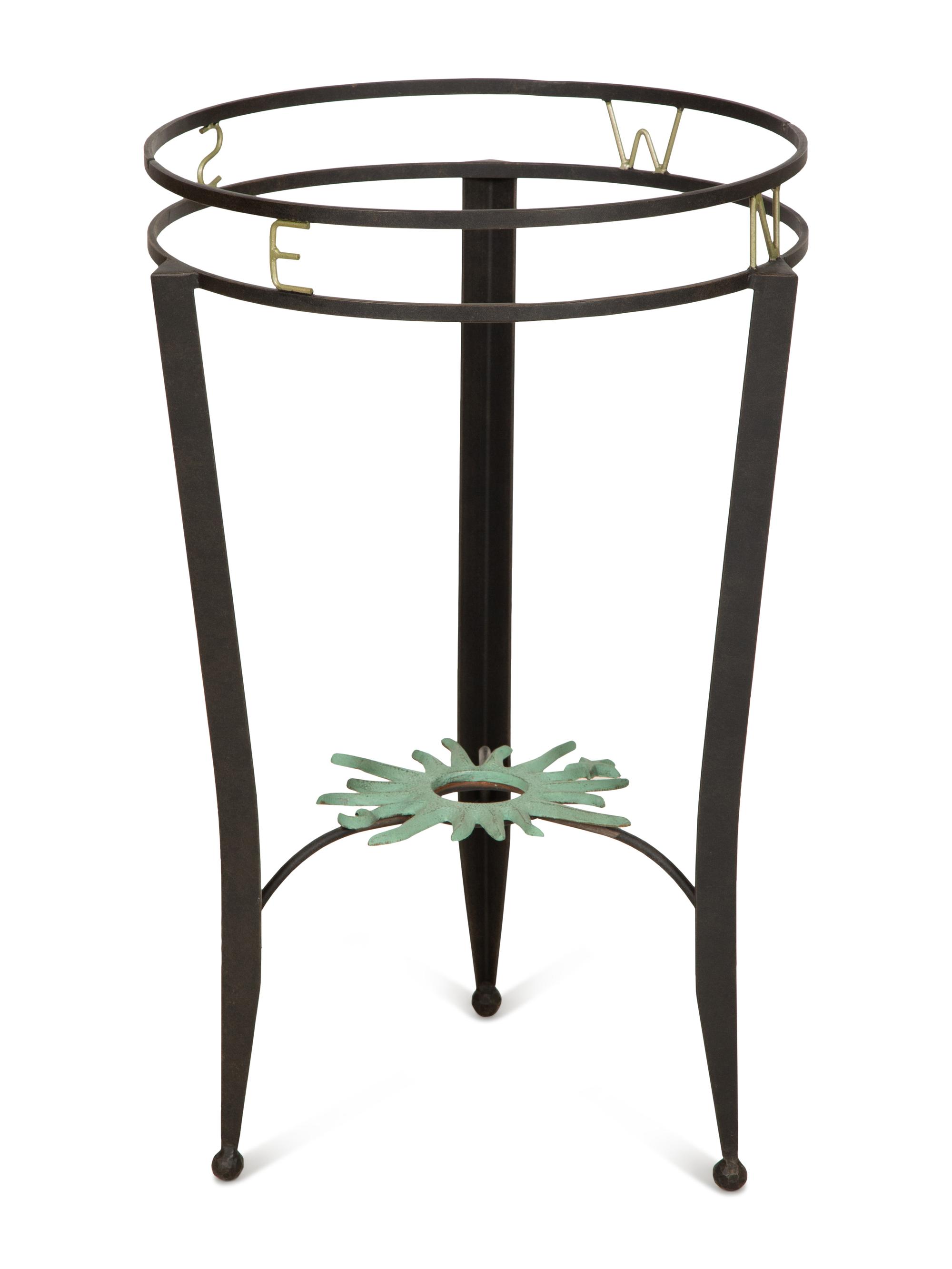 A Wrought Iron "Compass" Gueridon