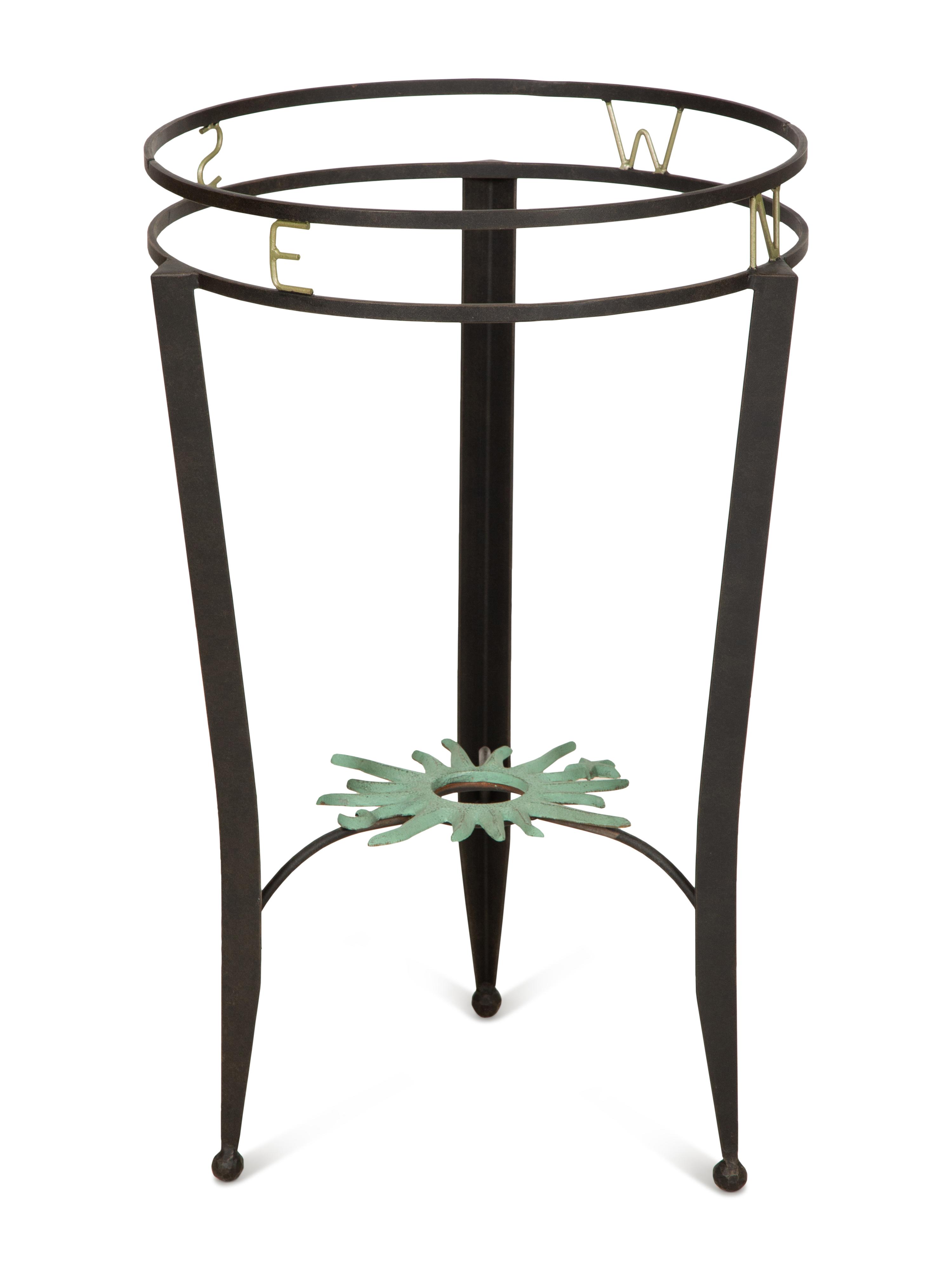 A Wrought Iron "Compass" Gueridon