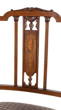 A Pair of Edwardian Mahogany and Marquetry Armchairs