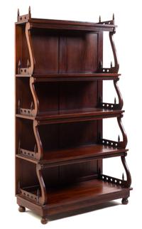 A Gothic Revival Mahogany Whatnot Height 64 x width 35 x depth 10 1/4 inches. — SECOND HALF 19TH CENTURY