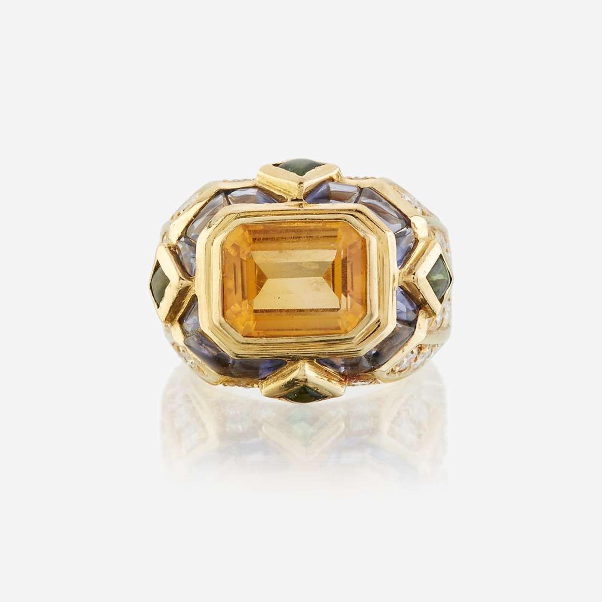 A citrine, diamond, sapphire, peridot, and eighteen karat gold ring