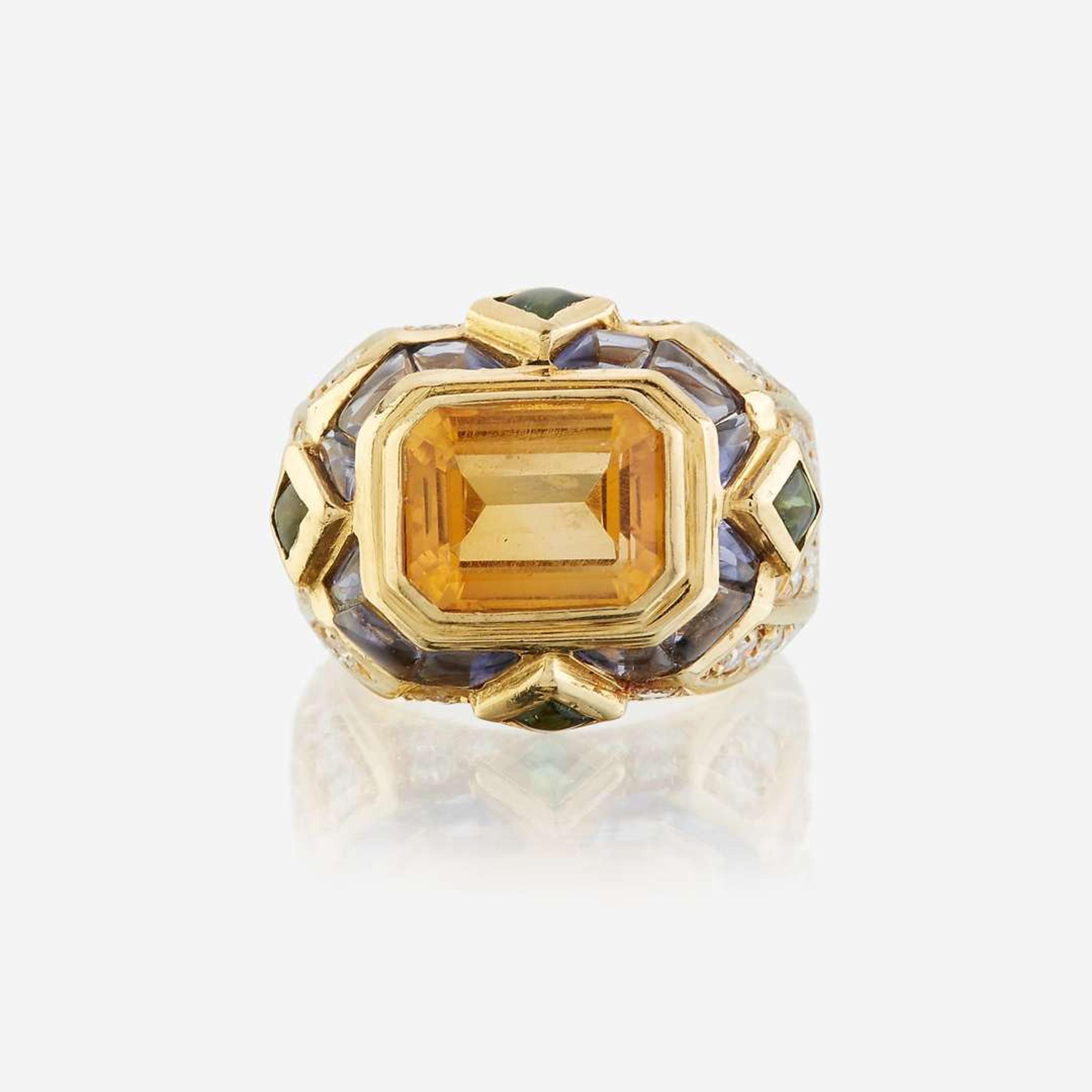 A citrine, diamond, sapphire, peridot, and eighteen karat gold ring