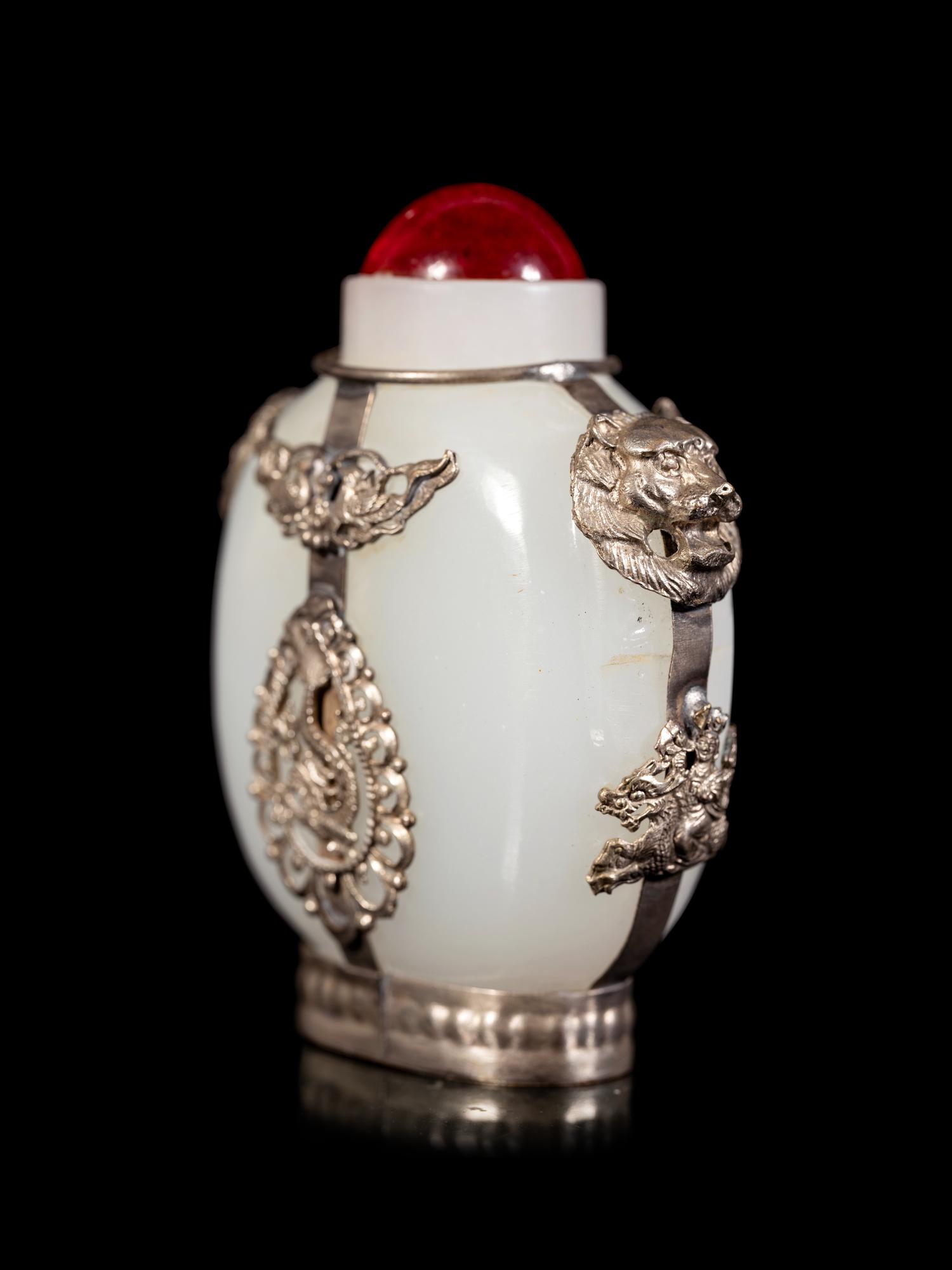 Four Tibetan Silver Mounted Snuff Bottles