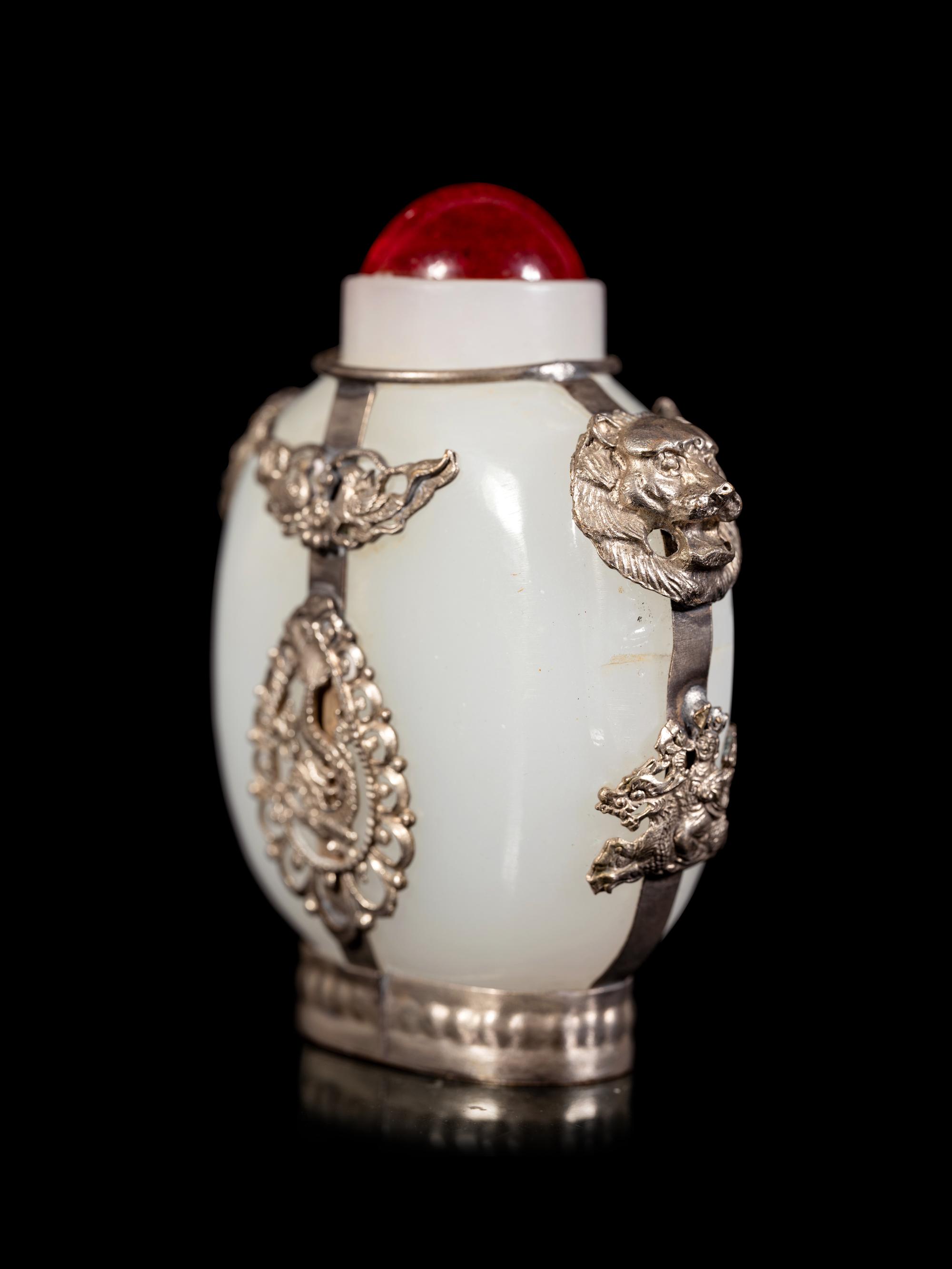 Four Tibetan Silver Mounted Snuff Bottles