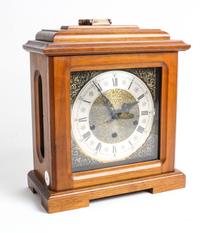 A German Mahogany Cased Mantel Clock Height 14 inches. — 20TH CENTURY