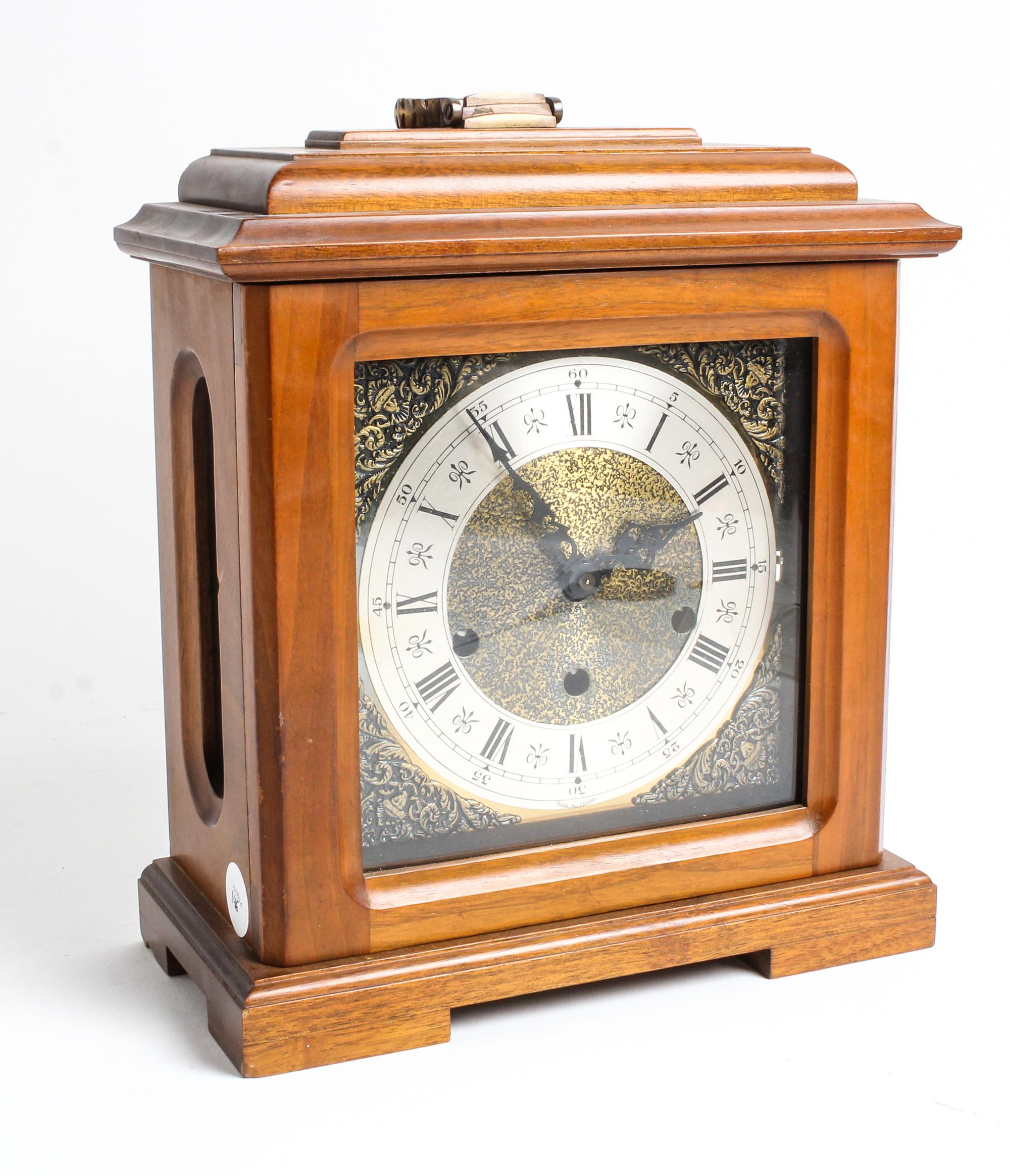 A German Mahogany Cased Mantel Clock Height 14 inches. — 20TH CENTURY
