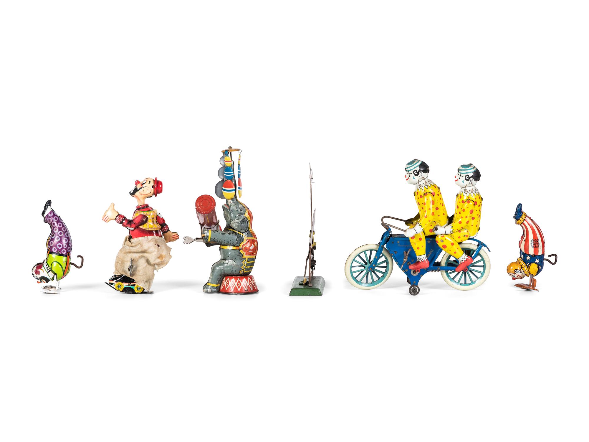 Six Tin Clown and Circus Toys