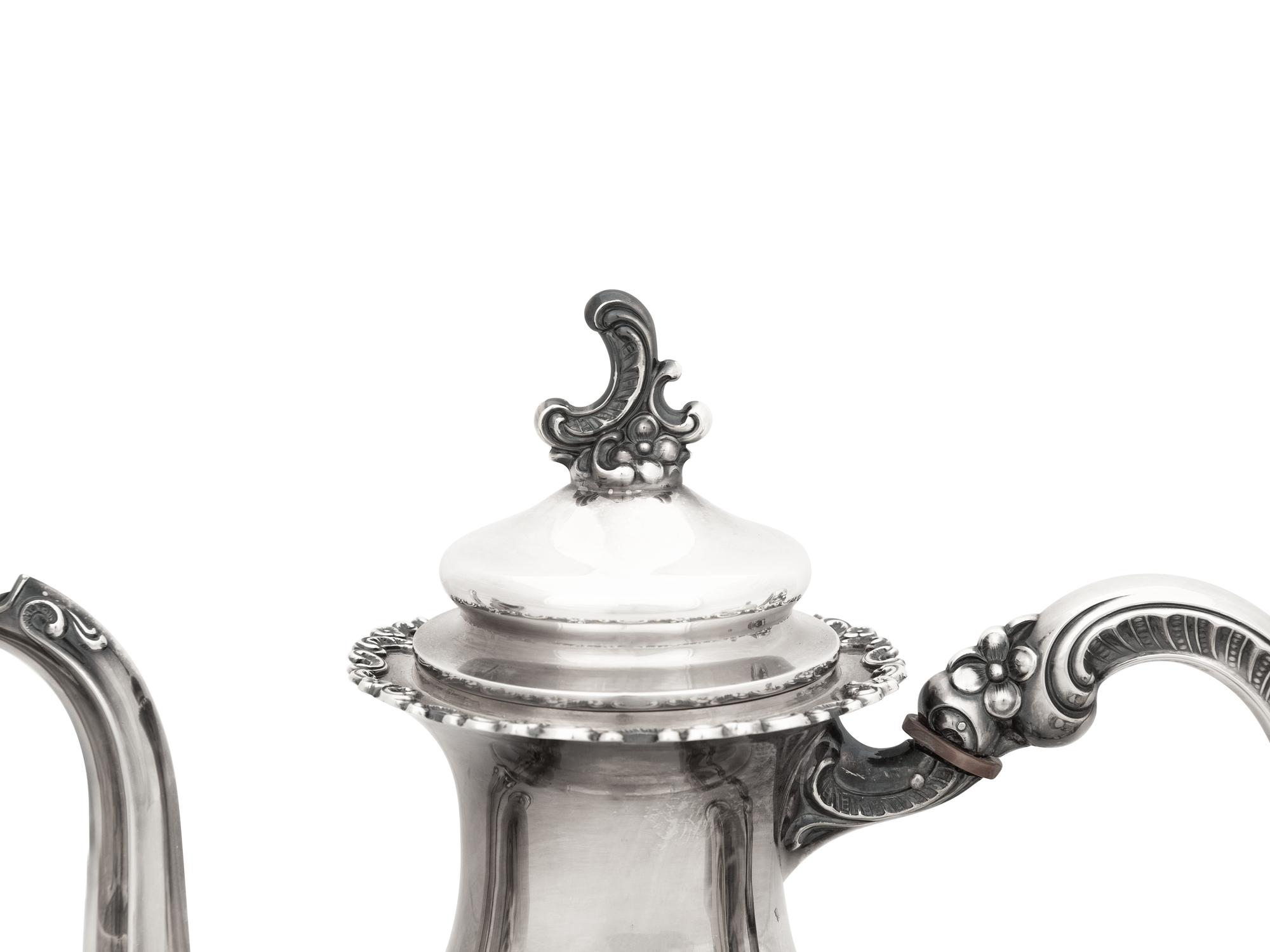 An American Silver Coffee Pot, Milk Jug and Sugar Bowl