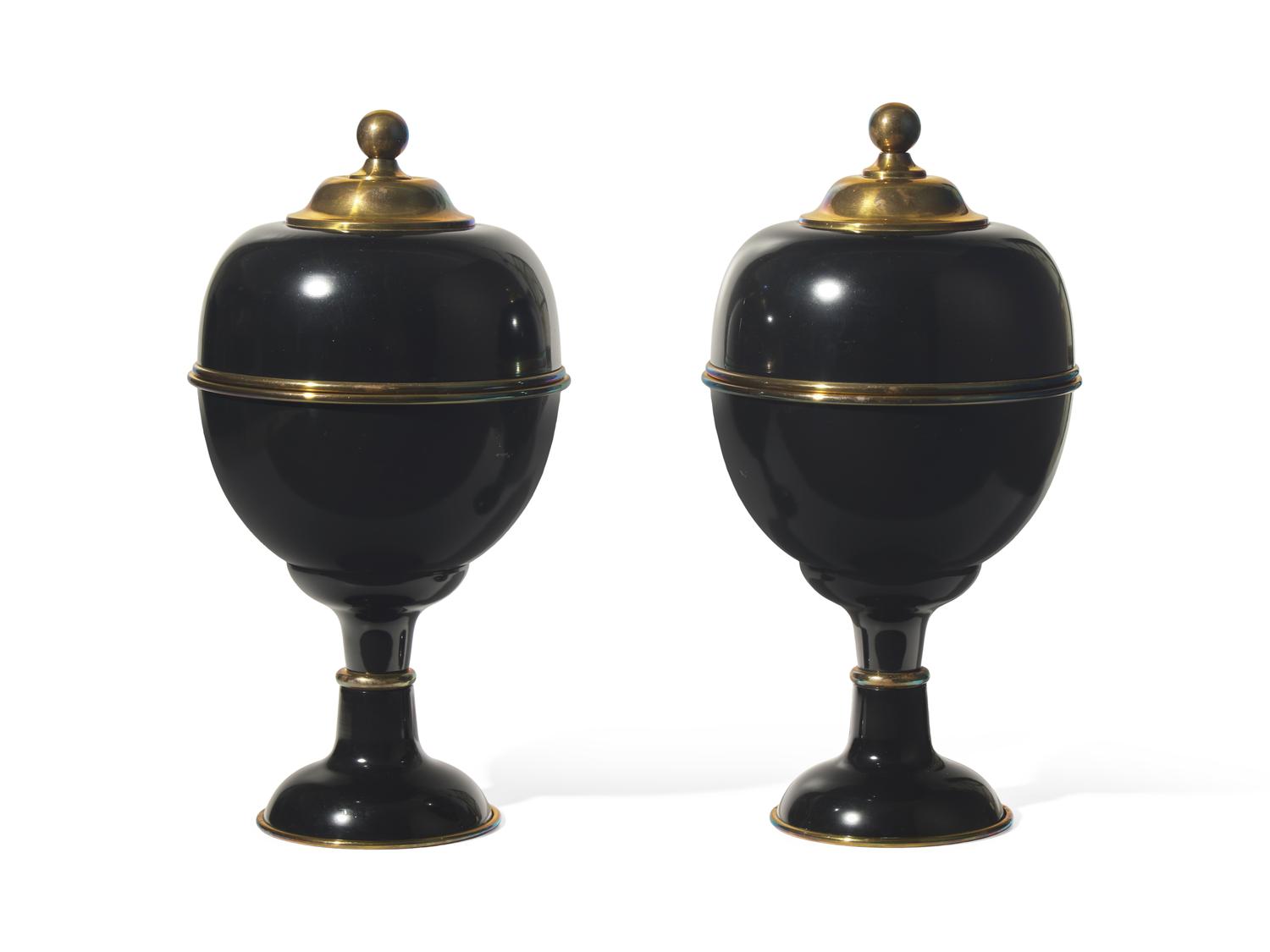 A Pair of Large Black Enameled and Brass Lidded Urns DONATED BY NATE BERKUS