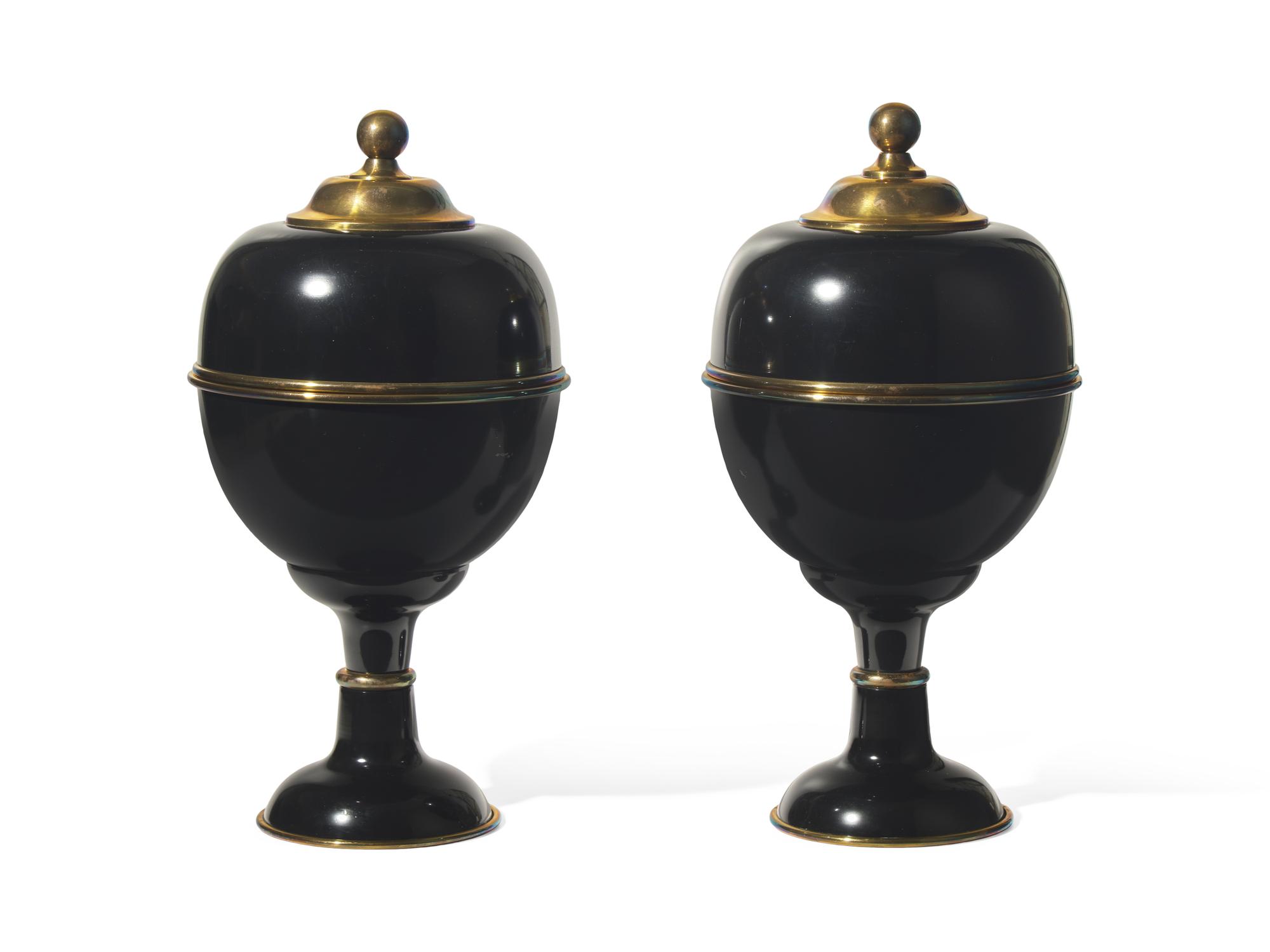 A Pair of Large Black Enameled and Brass Lidded Urns DONATED BY NATE BERKUS