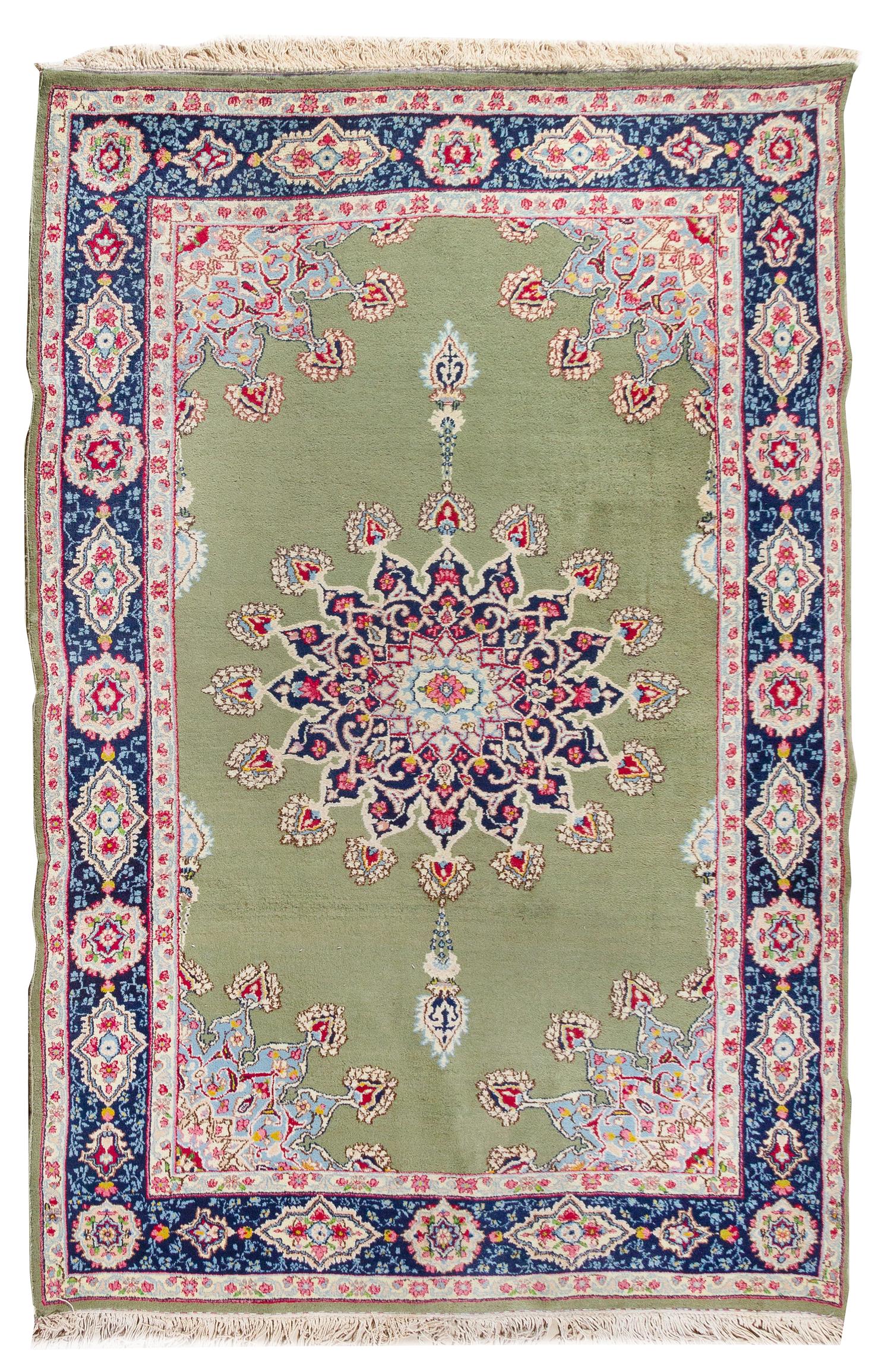 A Kirman Wool Rug 8 feet 3 inches x 5 feet 11 inches. — 20TH CENTURY