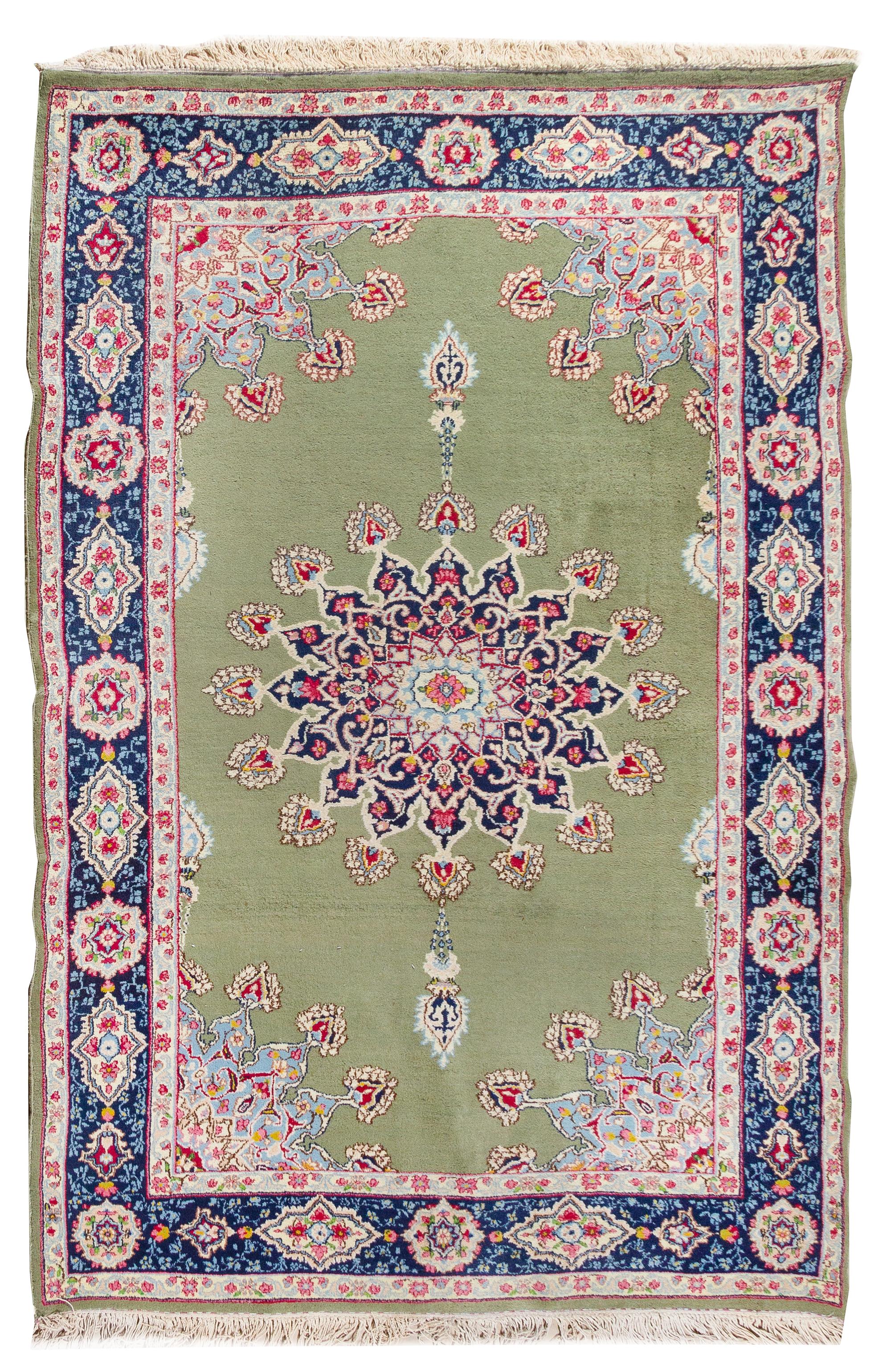 A Kirman Wool Rug 8 feet 3 inches x 5 feet 11 inches. — 20TH CENTURY