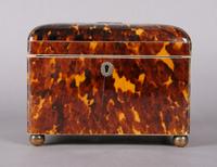 A George III Tortoise Shell Tea Caddy, Height 5 1/4 x width 7 x depth 4 1/2 inches.