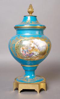 A Sevres Style Lidded Urn, Height 12 1/2 inches.