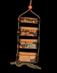 A Japanese Gold and Brown Lacquer Three-Case Inro