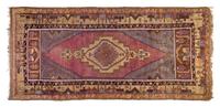 A Turkish Wool Rug 8 feet 2 inches x 4 feet.