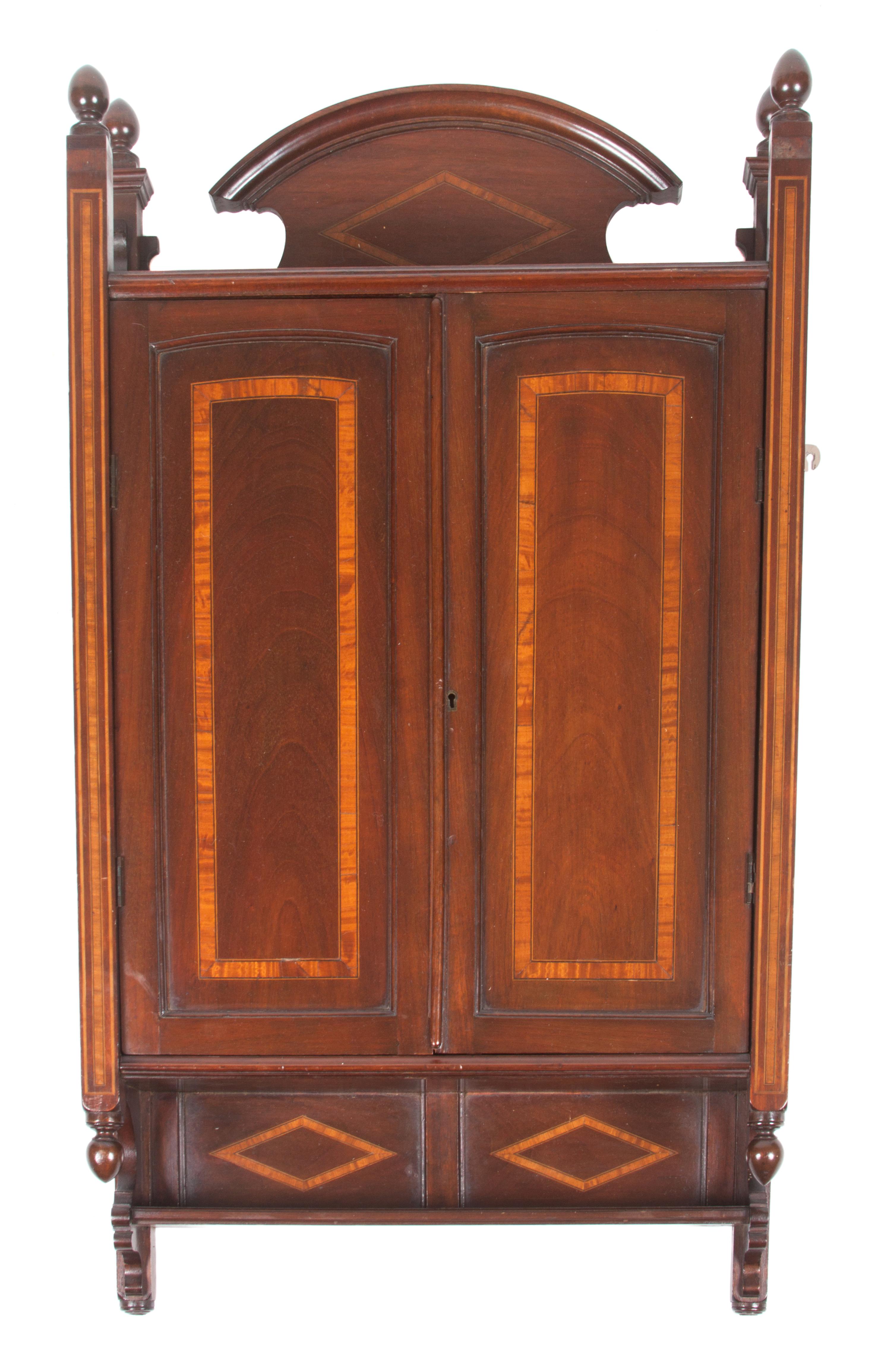 A Mahogany Barber Wall Cabinet Height 38 x width 22 x depth 7 inches.