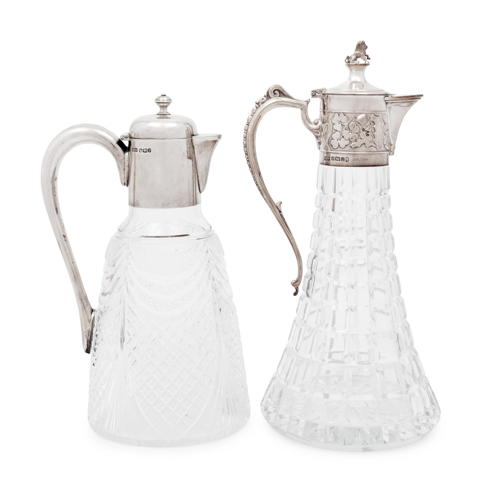 Two English Silver Mounted Cut Glass Claret Jugs