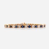 A diamond, sapphire, and fourteen karat gold bracelet