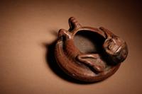 A Narino Terracotta Vessel of a Lying Man
