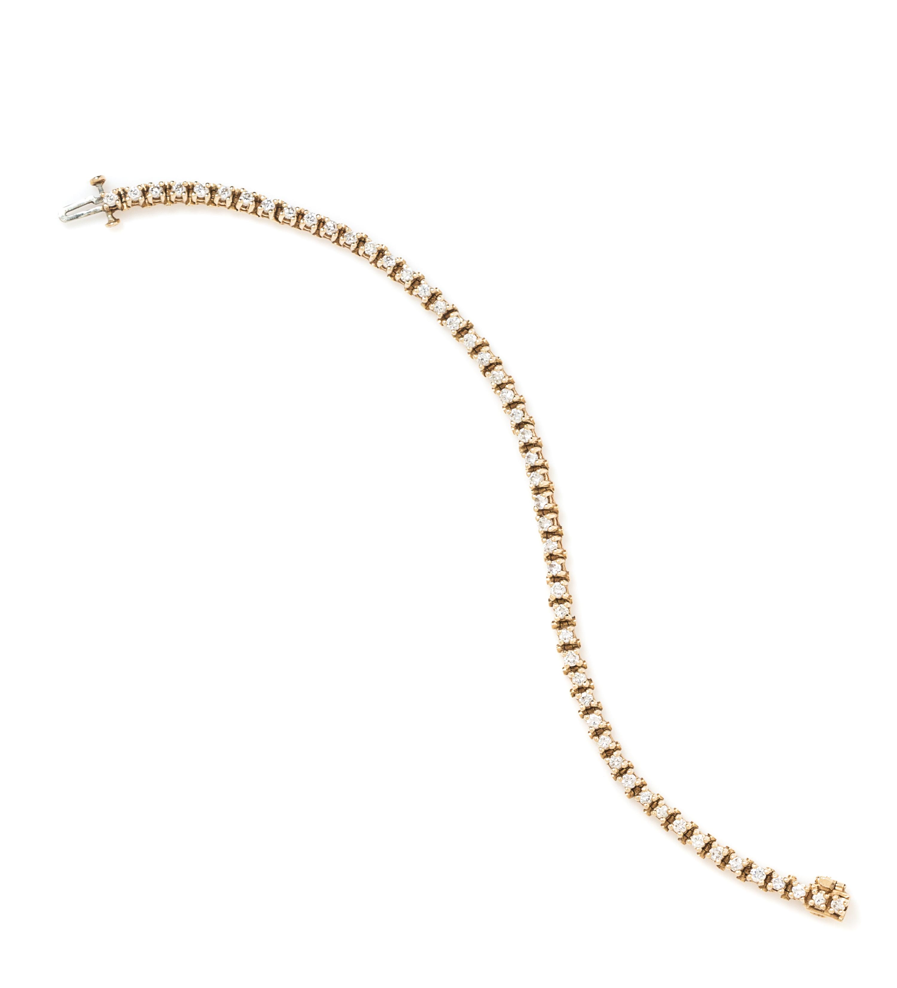 A Yellow Gold and Diamond Line Bracelet, 7.60 dwts.