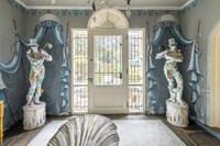 An Italian Baroque Style Walnut Cabinet