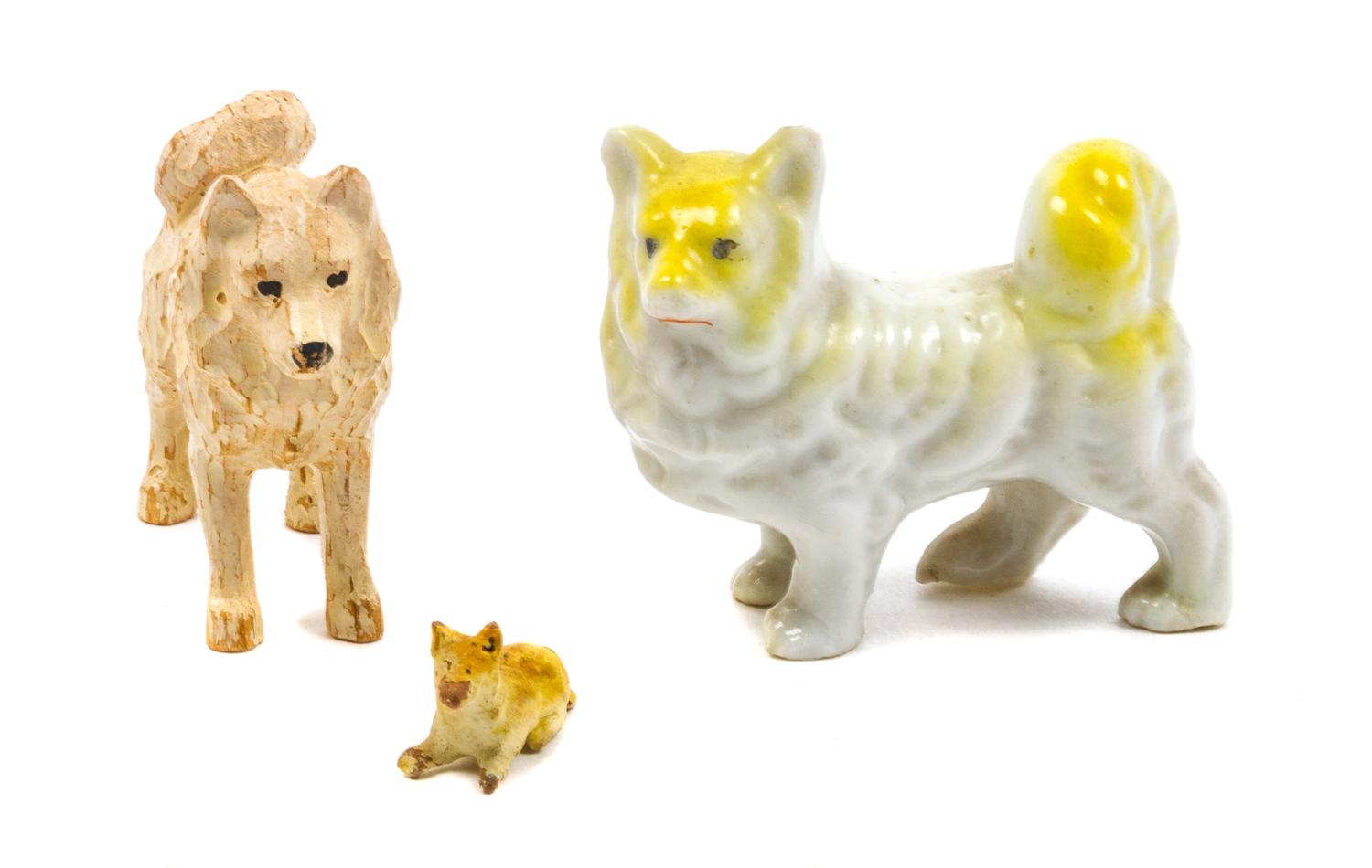 Three Finnish Spitz Figures Width of widest 1 3/4 inches.