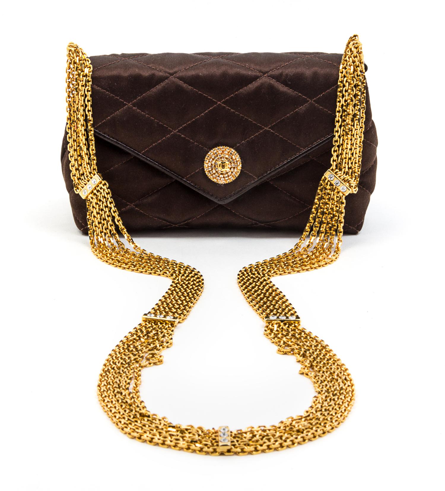 A Chanel Brown Satin Quilted Convertible Evening Bag, 6 1/2 x 4 x 2 1/2 inches.