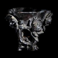 A Bronze Libation Cup
