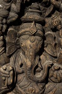 An Indian Carved Wood Panel of A Ganesha