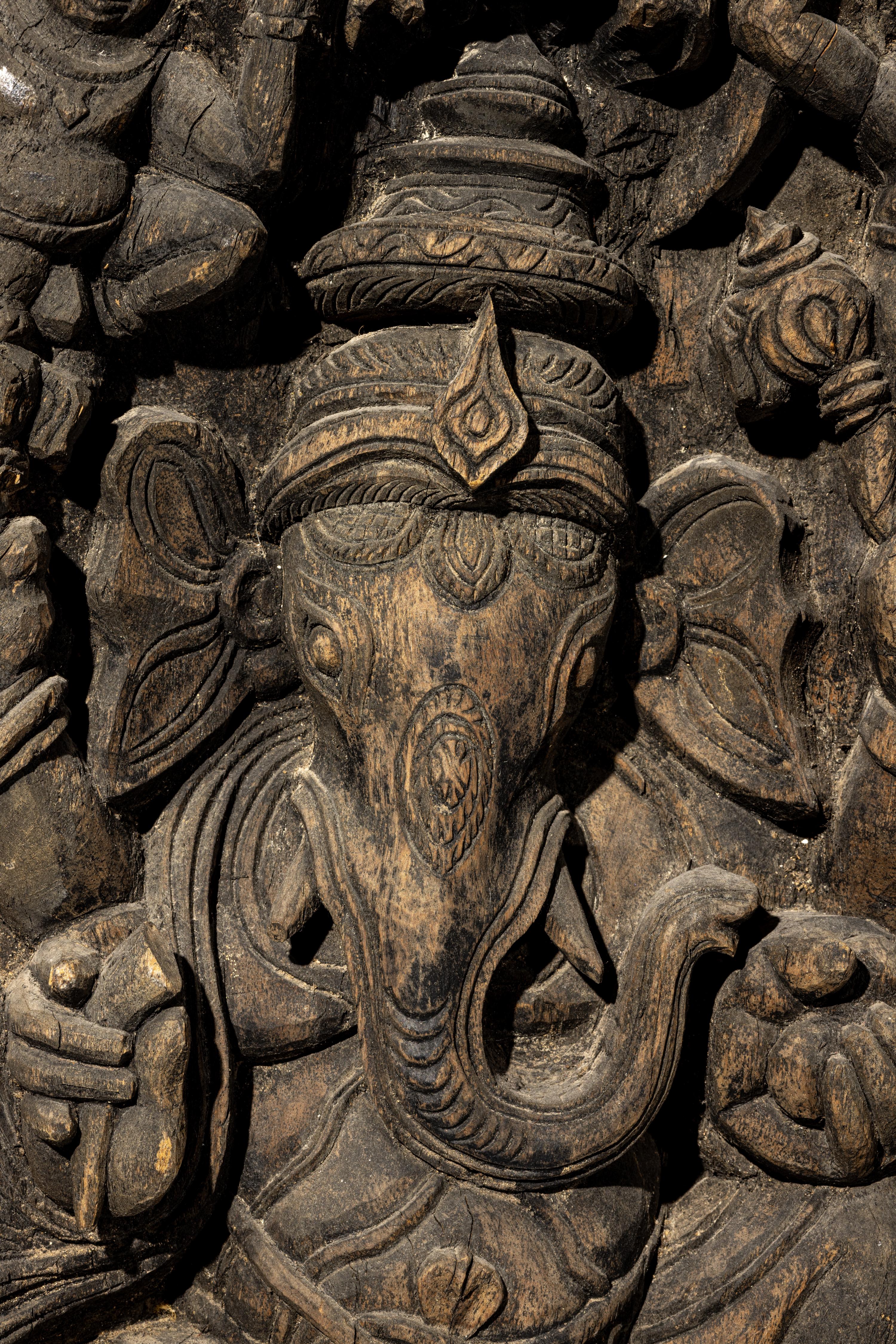 An Indian Carved Wood Panel of A Ganesha