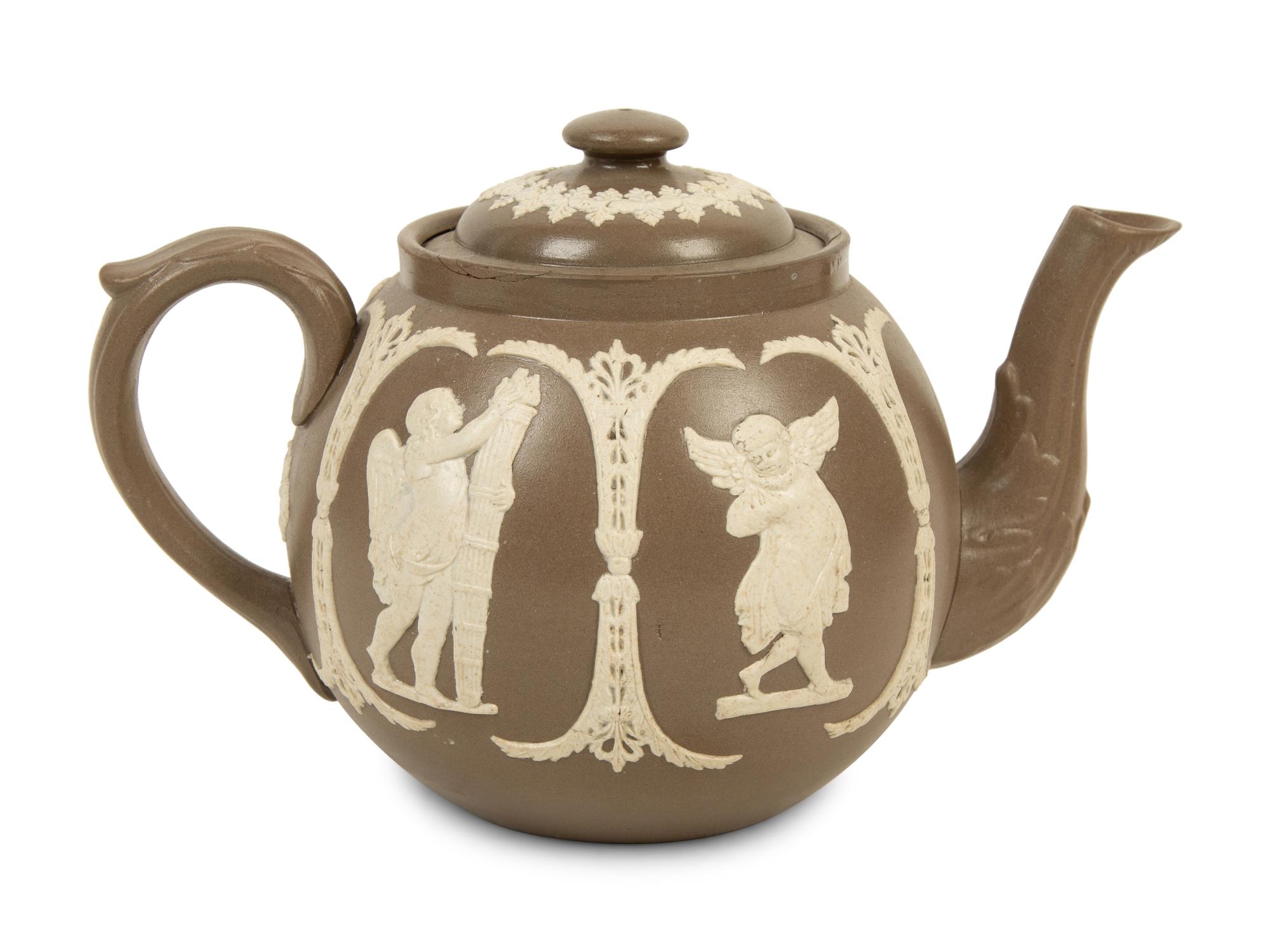 A Collection of Nine English Salt Glazed Relief Form Teapots, Pitchers and Creamers — 19TH/20TH CENTURY
