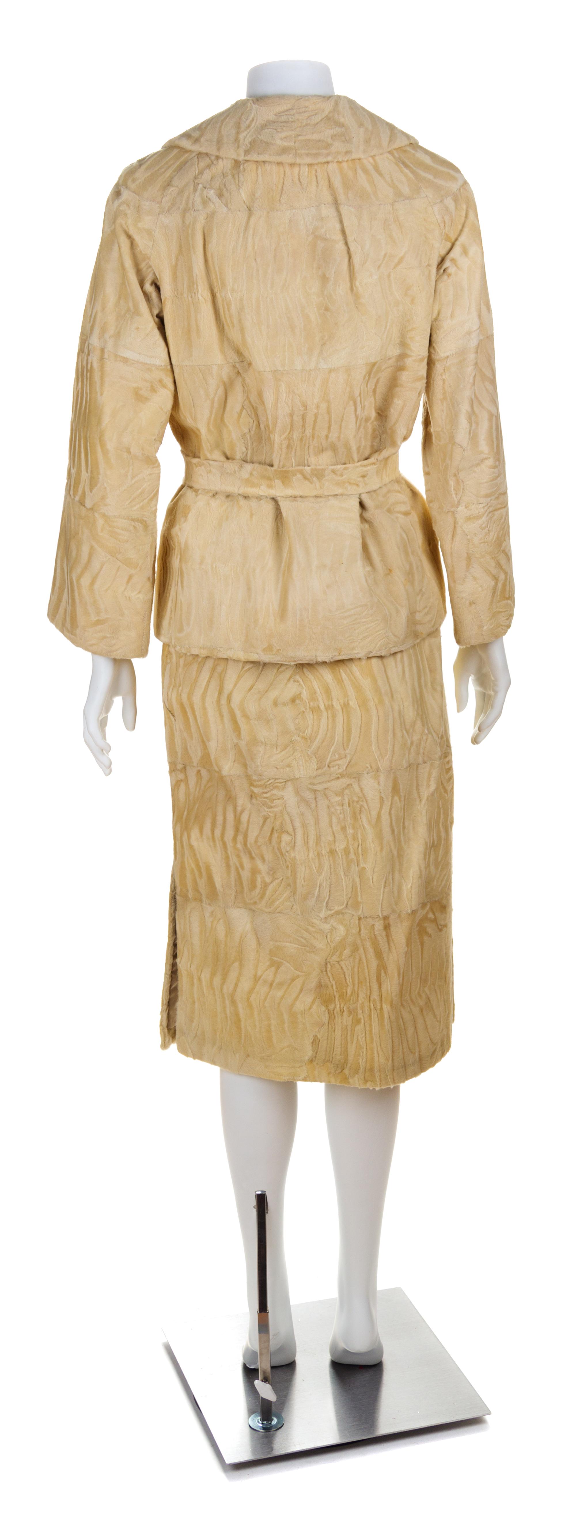 A Maximilian Cream Broadtail Skirt Suit, Jacket no size; Skirt no size; Self-tie: 58" X 1.5".