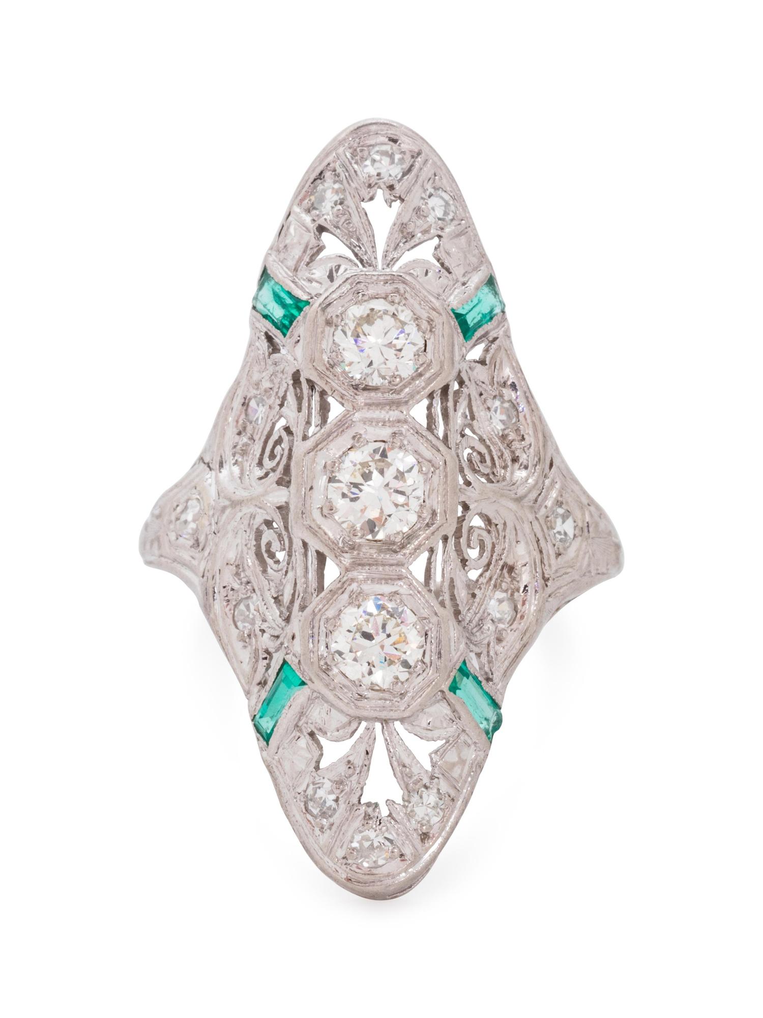 A Platinum, Diamond and Emerald Ring,